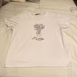 large white t shirt “grow through what you go through”